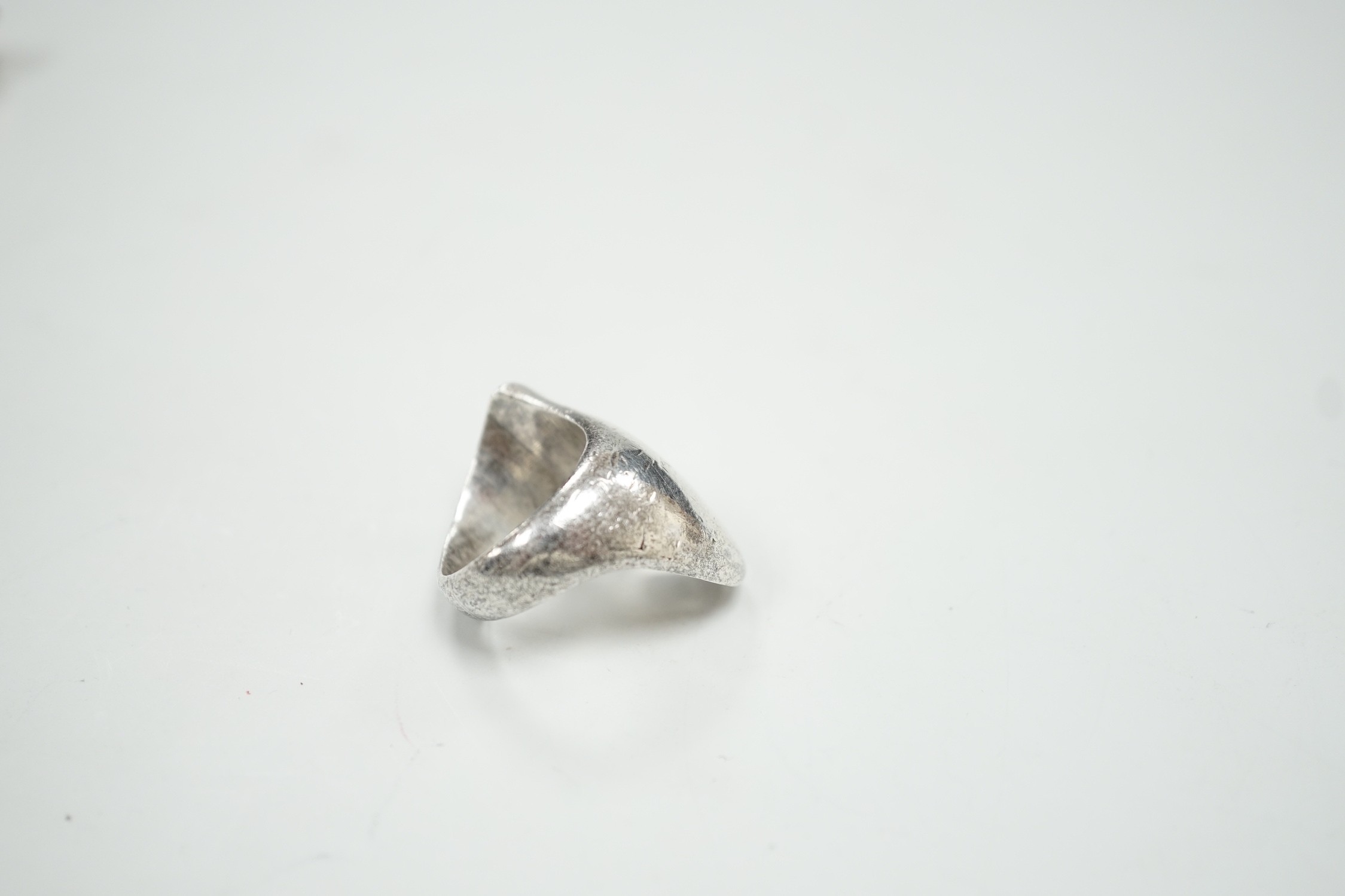 A 1960's Georg Jensen sterling silver dress ring, design no. 90, London import marks for 1966, size N/O.